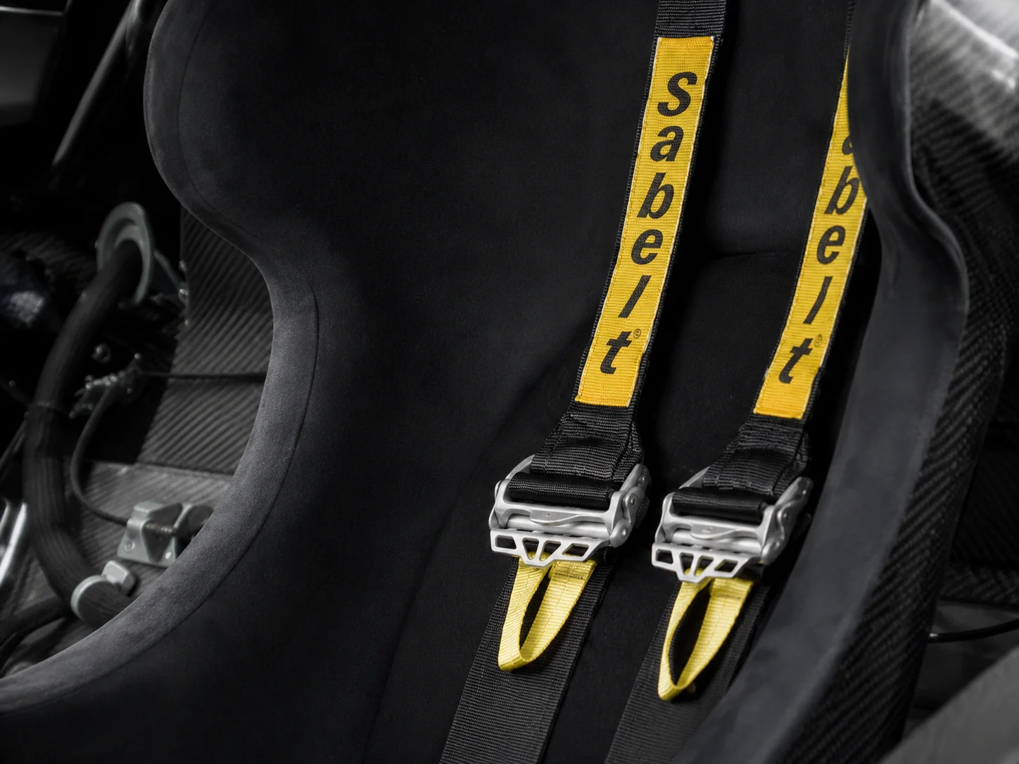 Seat and six-point Sabelt harness, close up