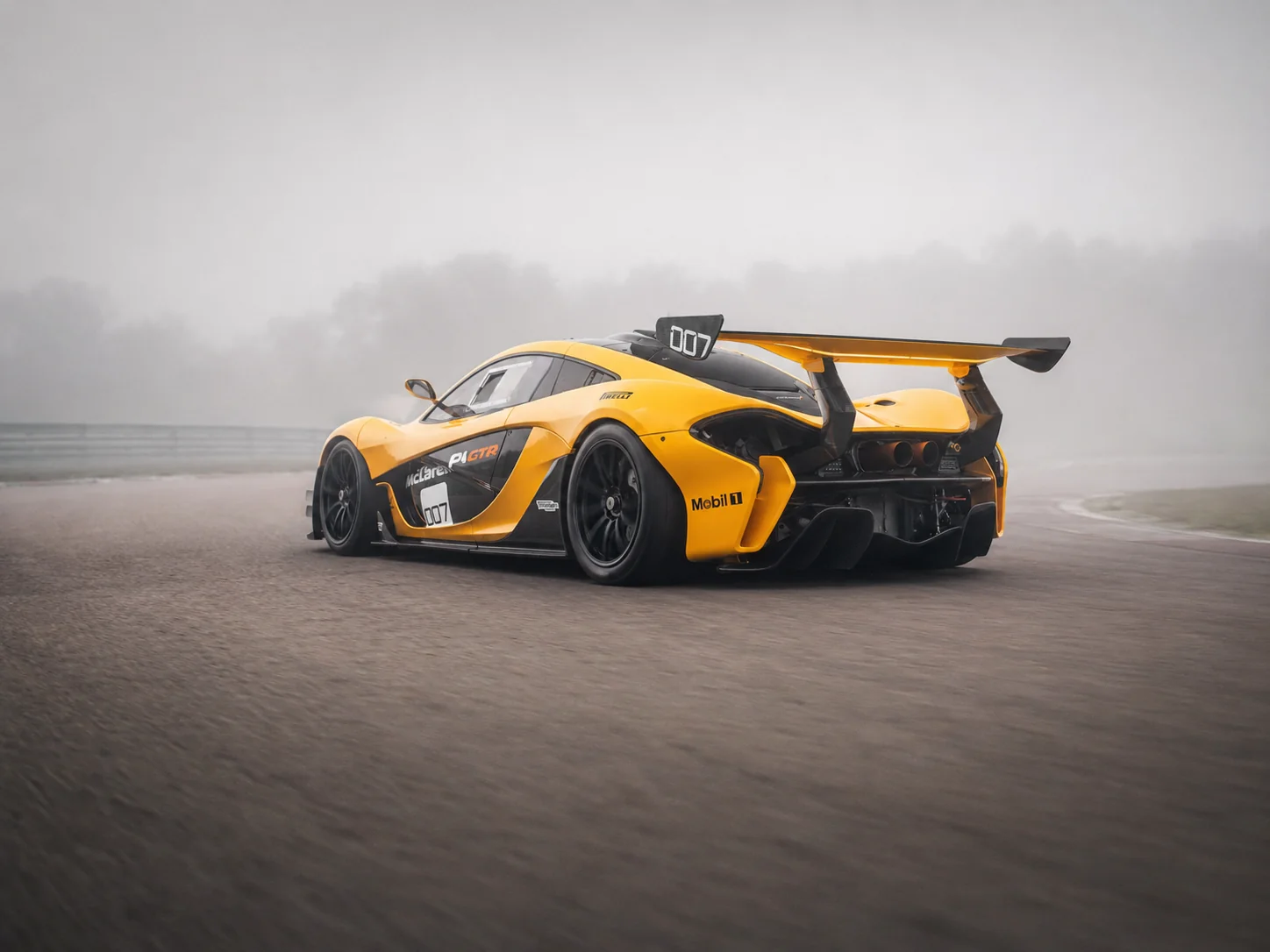 McLaren P1 GTR on circuit, with an implication of motion